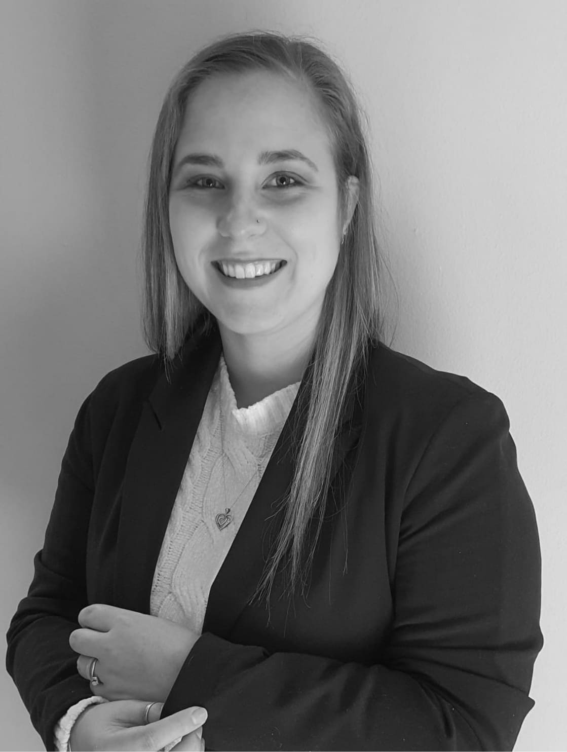 Tax Advisor at Mint Accounting, Tertia de Jager, smiling, in black and white.